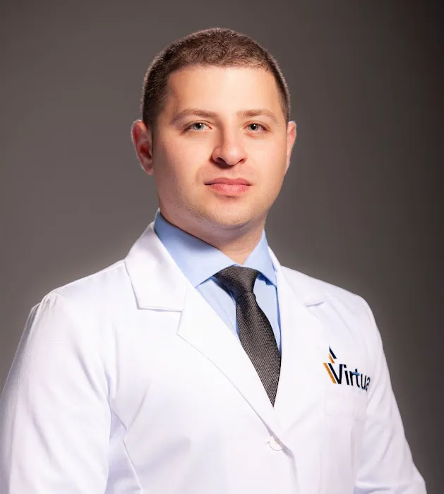 Eduard Koman, MD 1
