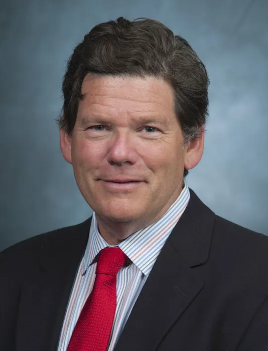 Bruce E. Lewis, MD 1