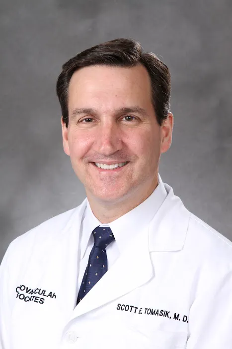 Scott E. Tomasik, MD 0