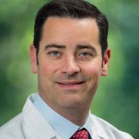 Curtiss Stinis, MD