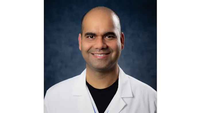 Ravi Sharma, MD 1