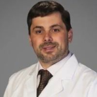 Adrian G Dan, MD