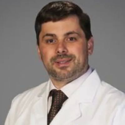 Adrian G Dan, MD