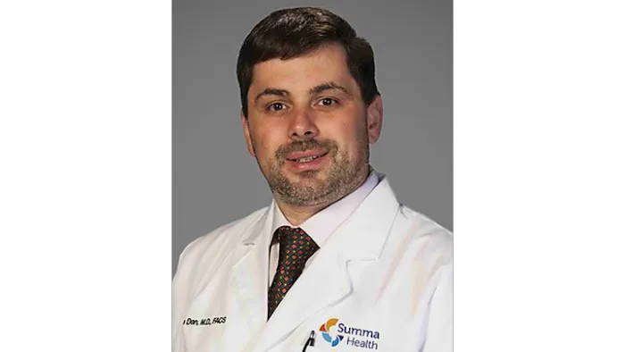 Adrian G Dan, MD 1