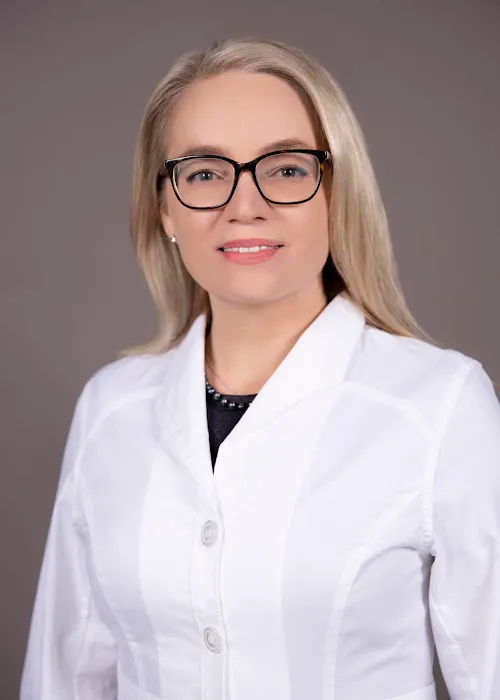 Olga Kristof-Kuteyeva, MD 1