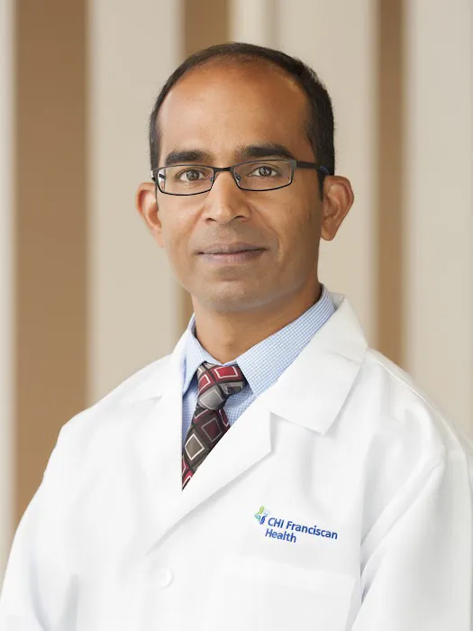Nasir Shariff, MD, FRCP 0