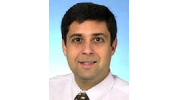 John L. Cotton, MD 1