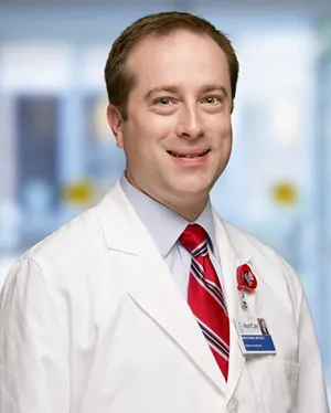 Mark C. Skains, MD 0